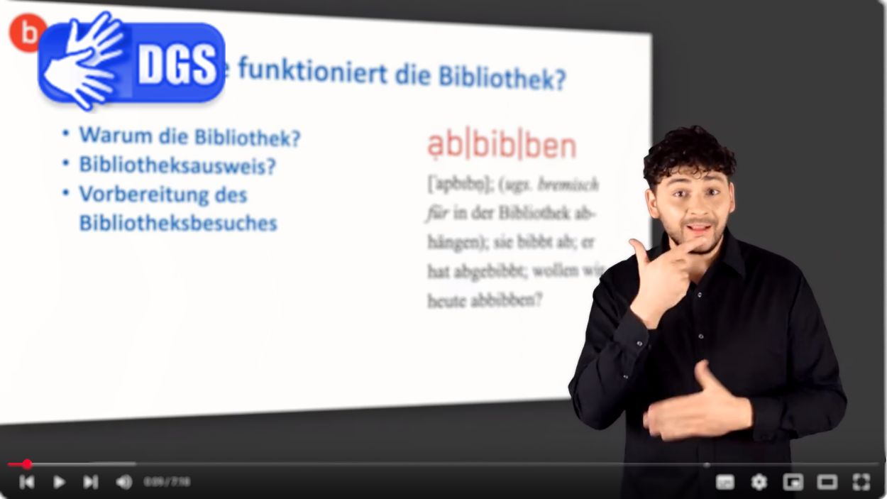 Videoreihe der Staats- und Universitätsbibliothek in DGS Screenshot eines Videos. Im Vordergrund ist ein Mann, der gebärdet. Im Hintergrund ist eine verschwommene Präsentation.