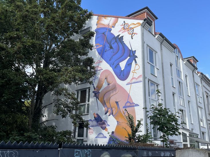 Die Wandfl&auml;che mit dem Gem&auml;lde zum HSB-Forschungsthema im Bremer Viertel.