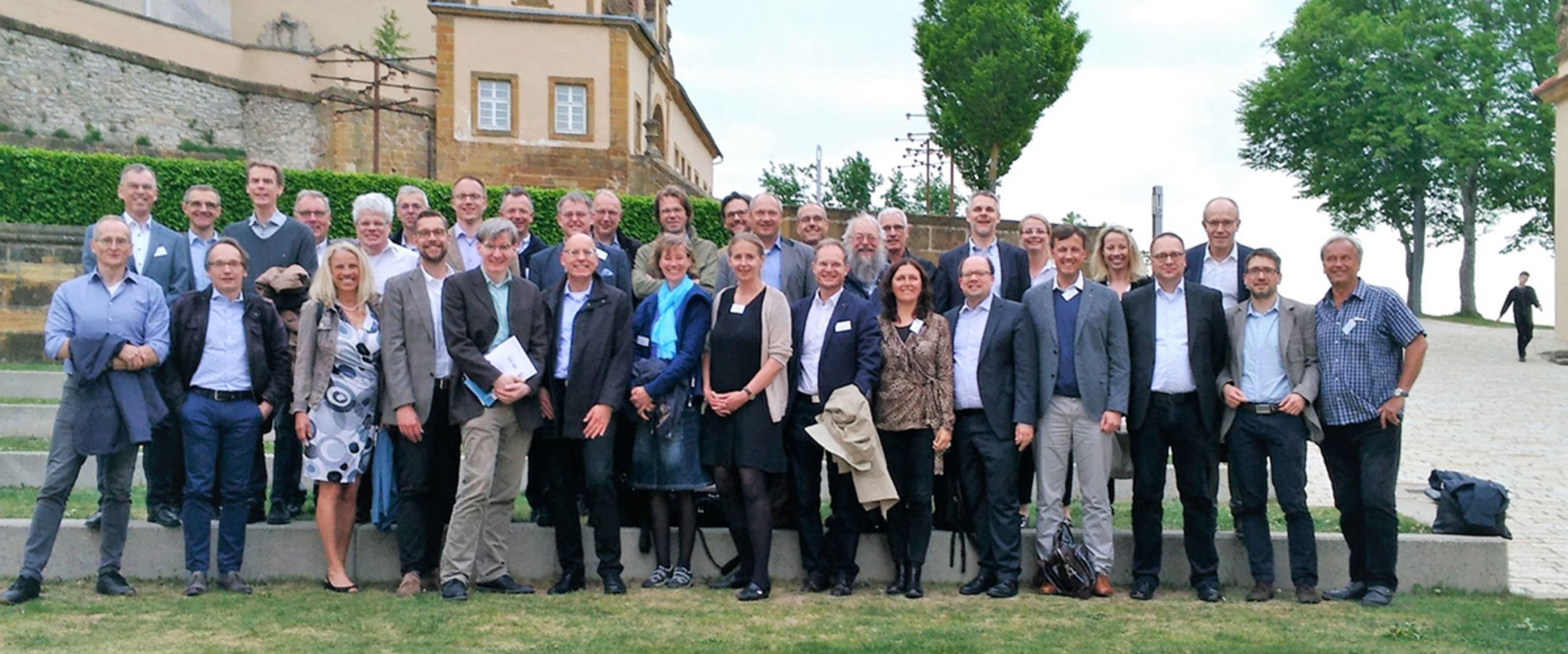 Gruppenbild mit Teilnehmer:innen der AKC-Tagung.