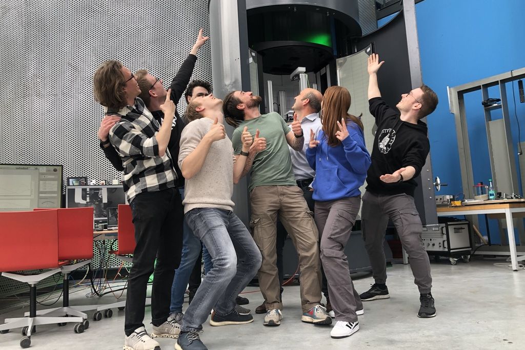 Part of the VIBES team in front of the ZARM GraviTower Pro