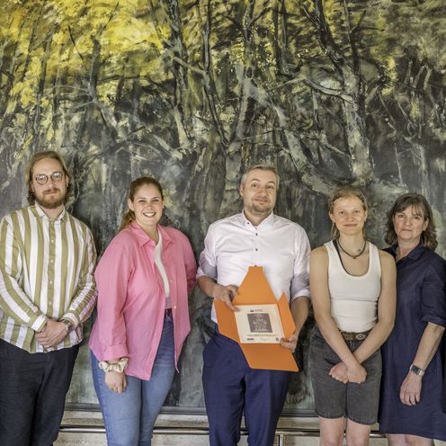 Gruppenbild mit M&auml;nnern und Frauen